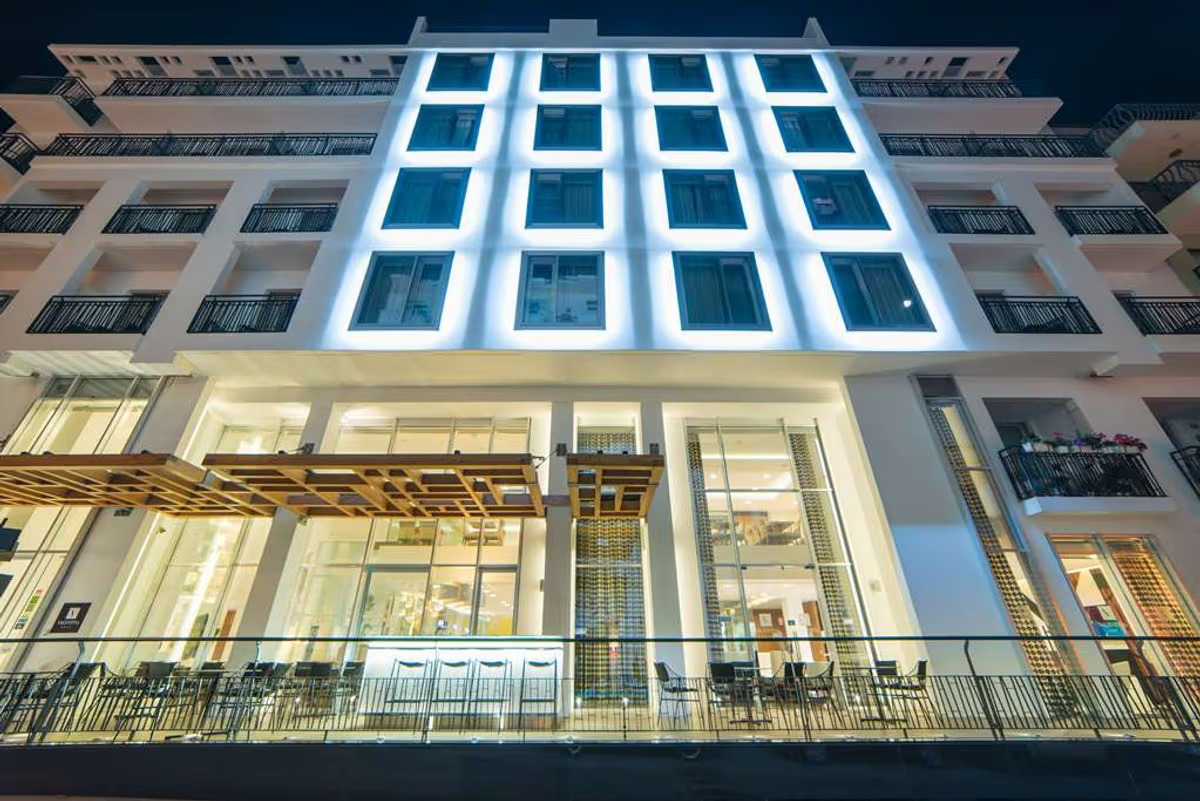 Hotel Valentina facade illuminated at night