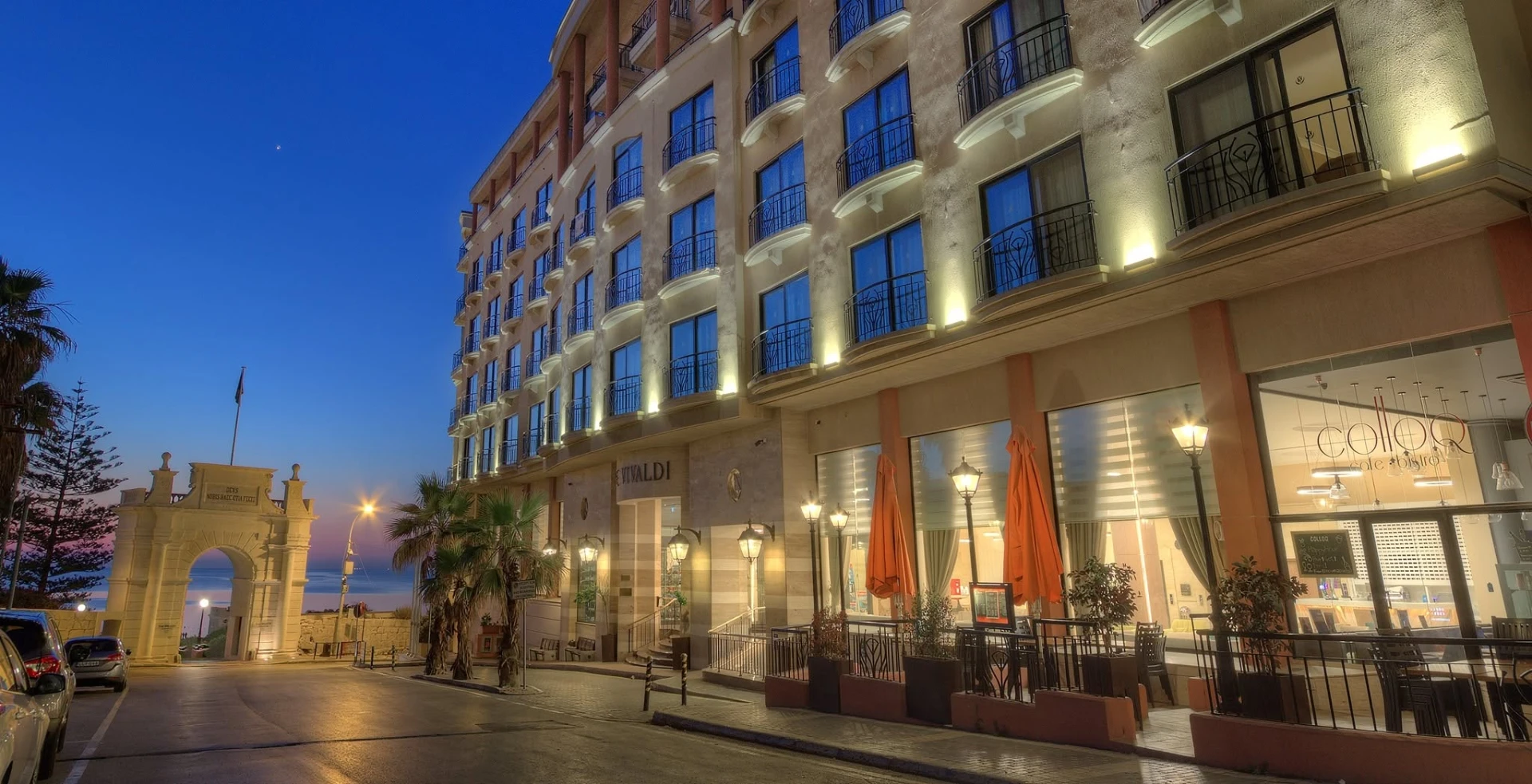 Vivaldi Hotel St Julian's facade at dusk