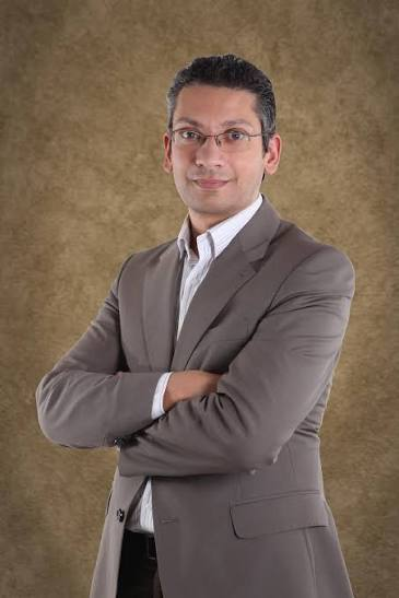 Dr Mario Caruana Grech Perry
